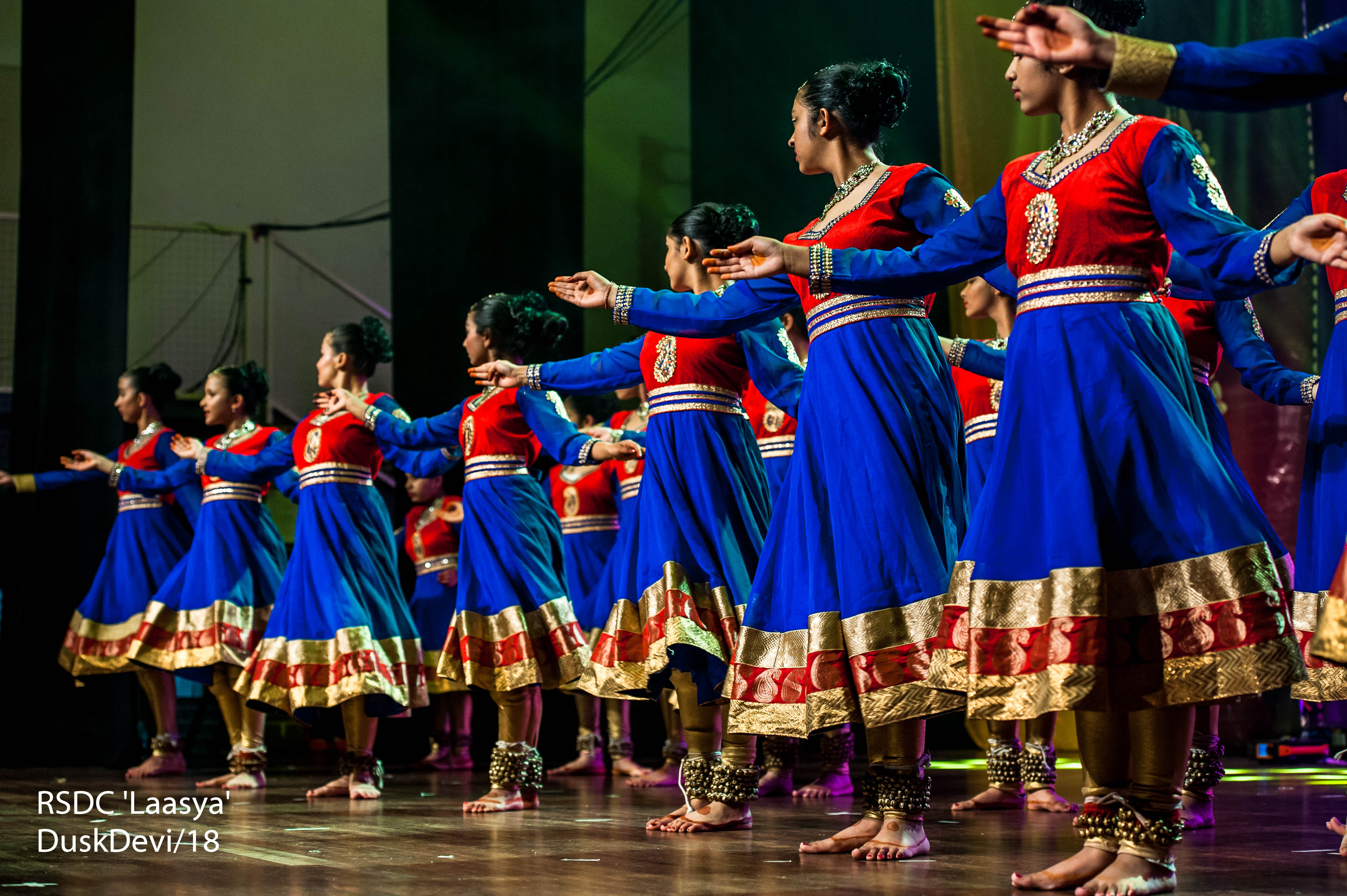 Ruchi Sanghi Dance Company Kathak Banner dancers showing mudra and ghungroo